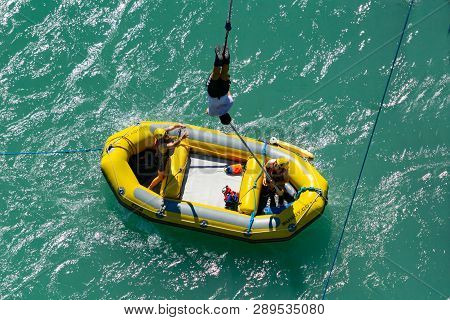 Queentsown New Zealand - October 21 2018; After Jumping Being Pulled Into Waiting Inflatable At Aj H