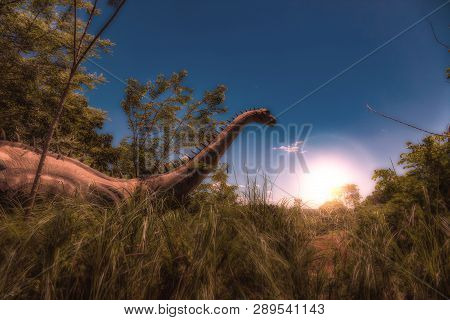 Dinosaur In Tall Grass At Sunrise -  Compositing