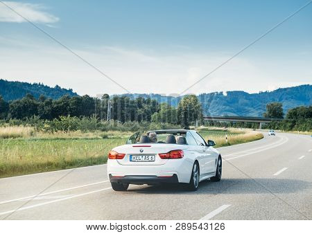 Schiltach, Germany - Jun 10, 2018: German Highway With Luxury Bmw Convertible Cabriolet Car Driving 