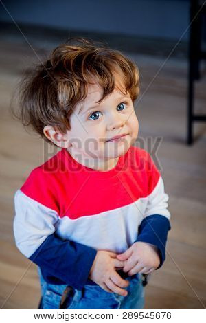 Little Todler Boy Stay At Kitchen In A Day And Watiching Something