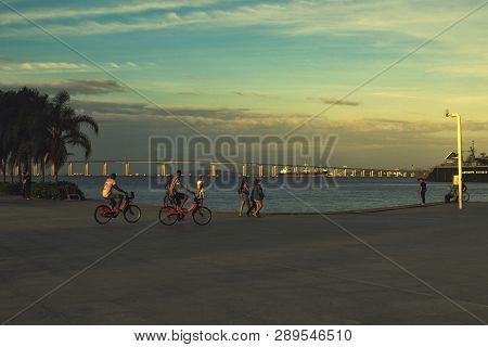 Rio De Janeiro, Brazil. August 05, 2018. Pedestrians Walking And Cycling In Maua Square (praça Mauá 