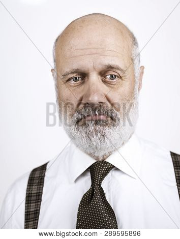 Disappointed Senior Man On White Background