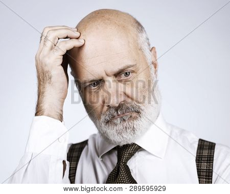 Pensive Senior Man Portrait