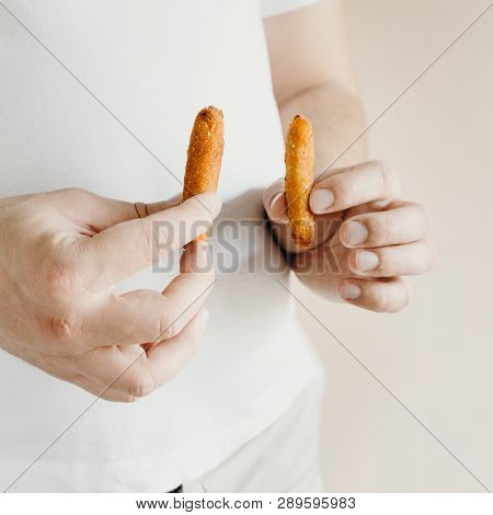 Processed Products, Fast Food, Unhealthy Diet, Imbalanced Ration. Overweight Man Eating Chicken Nugg