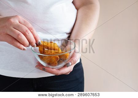 Processed Products, Fast Food, Unhealthy Diet, Imbalanced Ration. Overweight Woman Eating Breaded Fa