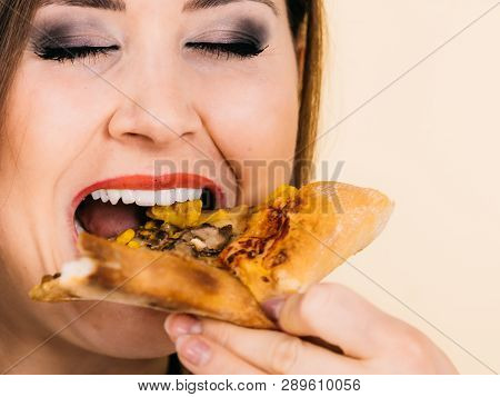 Woman Eating Hot Pizza Slice