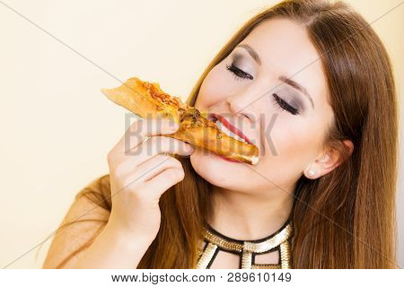 Woman Eating Hot Pizza Slice