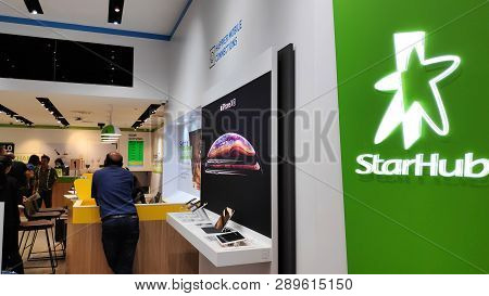 Singapore- 14 Mar, 2019: Customers Visit Starhub Retail Shop In Singapore. Starhub Ltd Is One Of The