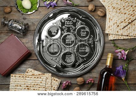 Flat Lay Composition With Symbolic Passover (pesach) Items On Wooden Background