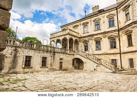 Exterior On The Podgoretsky Castle Of General Access In Ukraine In The Summer On A Clear Day With Bl