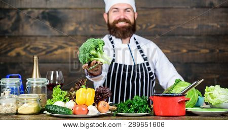 Organic Food. Fresh Ingredients Only. Vegetarian Meal. Man Cooking Fresh Vegetables. Culinary Recipe