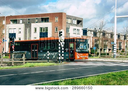 Papendrecht Netherlands March 12, 2019 View Of A Classic Dutch City Bus Rolling In The Streets Of Pa