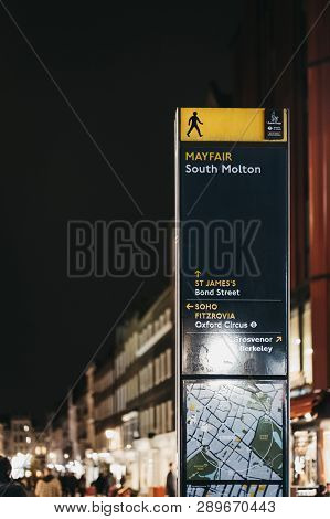 London, Uk - March 9, 2019: Directions And Map Board On Molton Street In Mayfair, Affluent Area In T