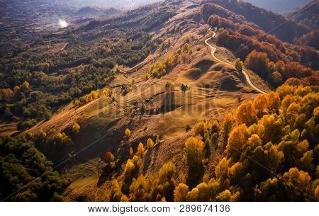 aerial view of Carpathian mountains countryside in autumn morning, Romania