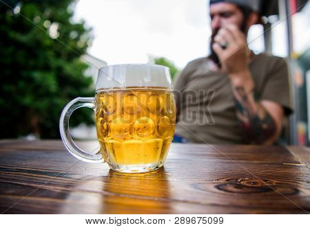 Relaxing With A Drink In The Comfortable Bar. Refreshing Drink On Cafe Table. Hipster Enjoying Beer 