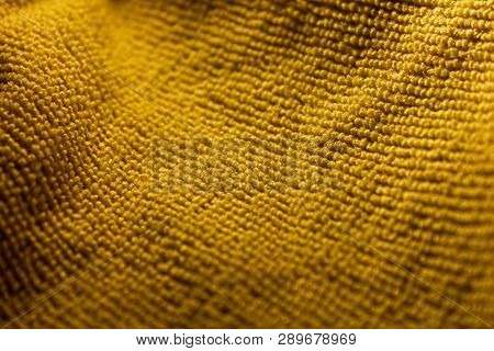 Abstraction Yellow. The Background Is Yellow. The Fabric Is Yellow. Bulk Texture. Microfiber.