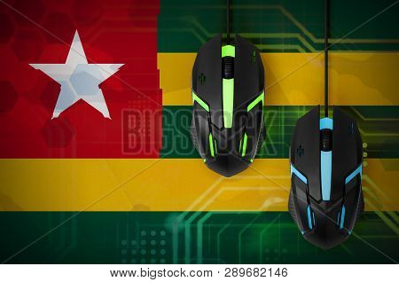 Togo Flag  And Two Mice With Backlight. Online Cooperative Games. Cyber Sport Team