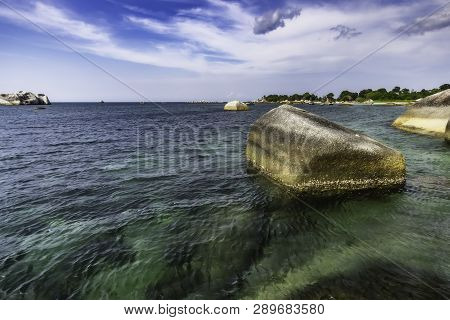 View Of A Group Of Big Stones On The Tanjung Tinggi Beach From Island Belitung/indonesia/