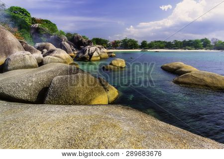 View Of A Group Of Big Stones On The Tanjung Tinggi Beach From Island Belitung/indonesia/