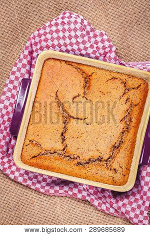 Homemade Semolina Cake On Sackcloth Background. Top View. Close Up