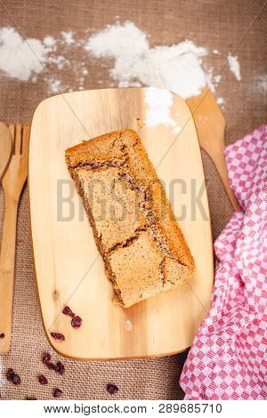 Piece Of Homemade Semolina Cake On Wooden Cutting Board. Top View. Close Up