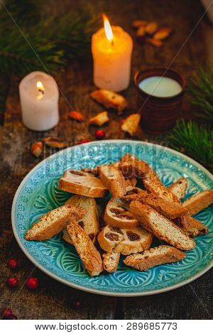 Biscotti Or Cantucci With Milk On Wooden Rustic Table. Close Up. Christmas Food Concept