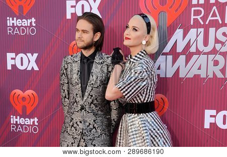 Zedd and Katy Perry at the 2019 iHeartRadio Music Awards held at the Microsoft Theater in Los Angeles, USA on March 14, 2019.