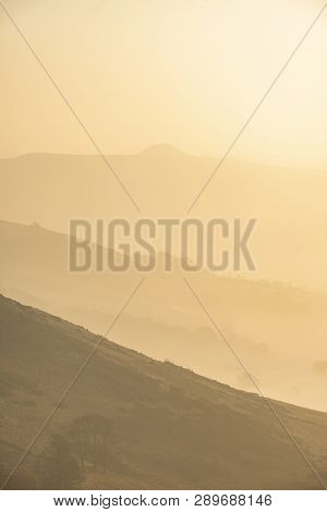 Beautiful Winter Sunrise Landscape Image Of The Great Ridge In The Peak District In England With Mis