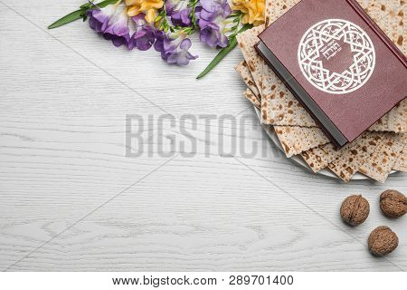 Flat Lay Composition With Matzo And Torah On Wooden Background, Space For Text. Passover (pesach) Se