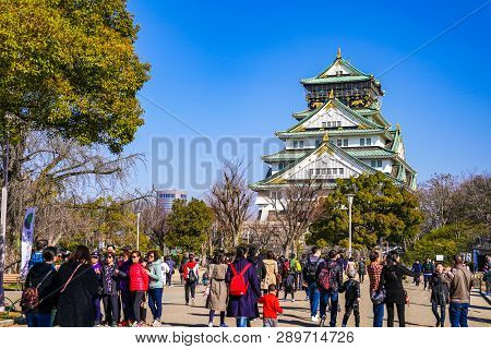 Osaka, Japan - 4 Mar 2018: Japanese, Tourists, Travelers Walked Around Osaka Castle In Mar 2018 With