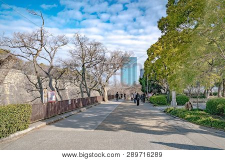 Osaka, Japan - 4 Mar 2018: Japanese, Tourists, Travelers Walked Around Osaka Castle Park In Mar 2018