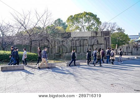 Osaka, Japan - 4 Mar 2018: Japanese, Tourists, Travelers Walked Around Osaka Castle Park In Mar 2018