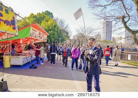 Osaka, Japan - 4 Mar 2018: Japanese, Tourists, Travelers Walked Around Osaka Castle Park In Mar 2018