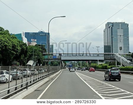 Jakarta, Indonesia - February 16, 2019: Cars Running On Jakarta Inner City Toll Road In Slipi Distri