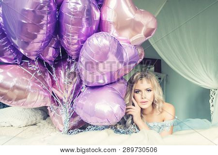 Beautiful Romantic Blonde Woman With Pink Bolloons Dreaming In Bedroom