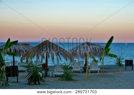 A Small Beach Near The Blue Calm Sea