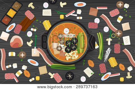 Hotpot And Ingredients On The Wooden Table