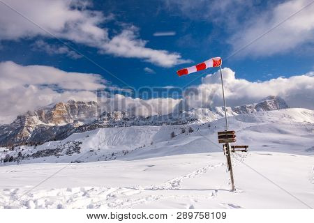 A Windsock In The Italian Alps In A Winter Day