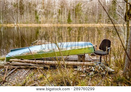 Landscape With A Boat And A Chair