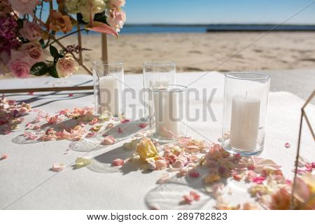 Event Decoration. Wedding Chuppa At Riverside Decorated With Fresh Flowers. Florist Workflow.