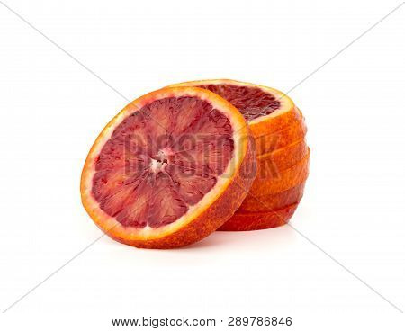 Bloody Orange On A White Background. Red Orange Cut Into Slices On A White Background.