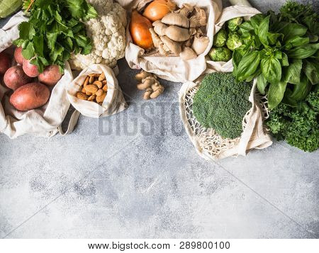 Healthy Vegan Ingredients For Cooking. Various Clean Wholesome Vegetables And Herbs In Woven Bags. P