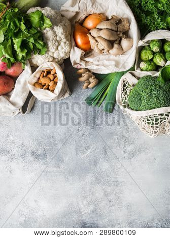 Healthy Vegan Ingredients For Cooking. Various Clean Wholesome Vegetables And Herbs In Woven Bags. P