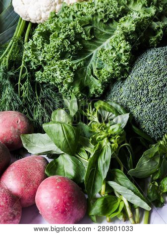 Healthy Green Vegan Ingredients For Cooking. Various Clean Green Vegetables And Herbs Background. Pr