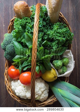 Wicker Basket With Various Vegetables And Herbs. Fresh Vegetables For Cooking. Local Clean Products 