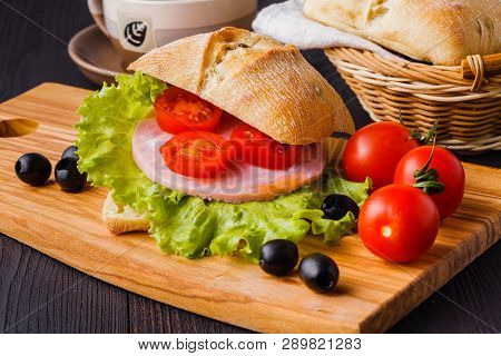 Panini Sandwiches With Fresh Tomatoes And Mozzarella And Prosciutto Ham, Italian Cuisine