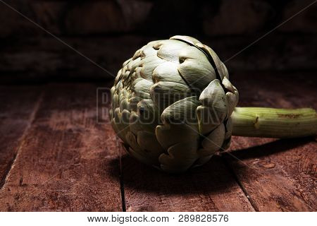 Artichokes On Rustic Background. Fresh Organic Artichoke Flower Set