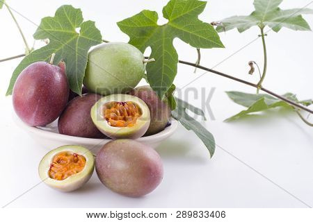 Fruits Of Gulupa On Vine Wood Table, Passiflora Pinnatistipula