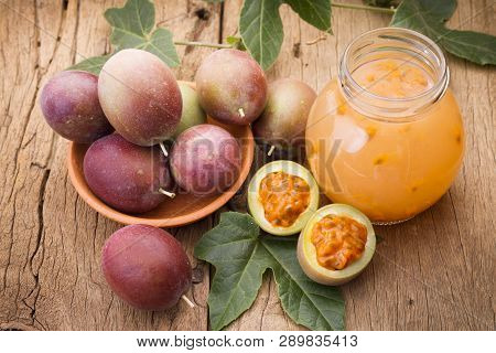 Fruits Of Gulupa On Vine Wood Table, Passiflora Pinnatistipula