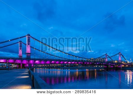 Krymsky Bridge Or Crimean Bridge  Across The Moskva River In Moscow In The Rays Of Setting Sun In Th